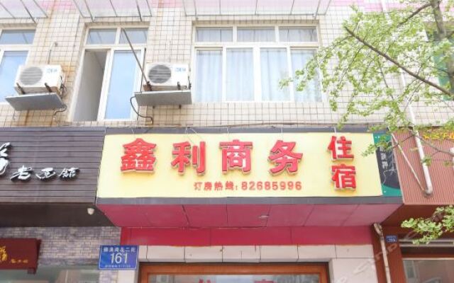 Xinli Business Hotel вид на фасад