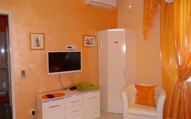 Orange Flower Apartments 1