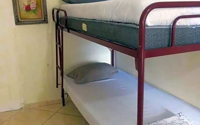 4 suites privativas