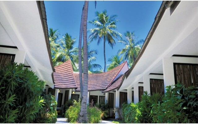 Отель Bandos Maldives