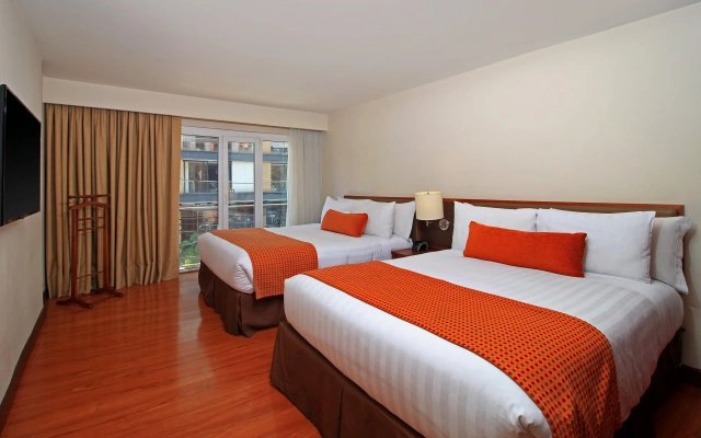 Отель Windsor House Inn By Geh Suites