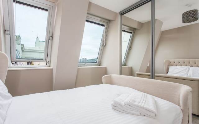 Апартаменты Brighton Beach Apartments комната для гостей