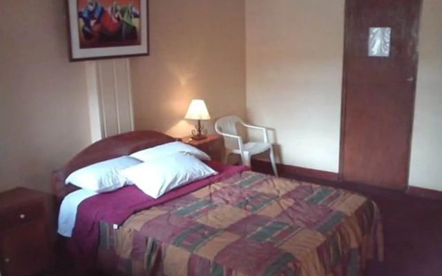 Hostal Tres Mascaras
