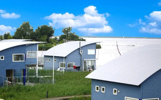 6pers. Lauwersmeer Lakefront. Nirvana house with sauna, pellet stove