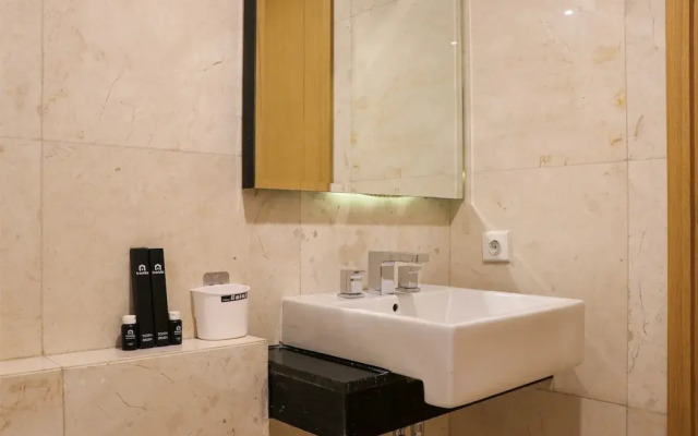Spacious Studio Room at Capitol Suites Apartment