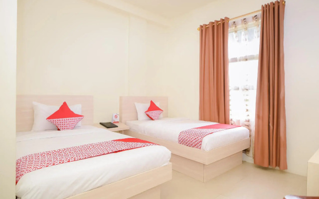 Capital O 854 Ub Caisar Hotel