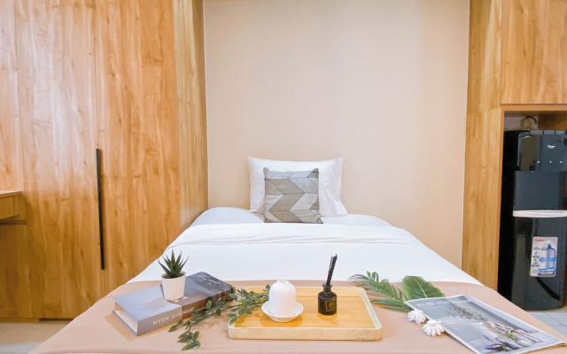 Compact Wood Accents Studio Apartment Grand Kamala Lagoon