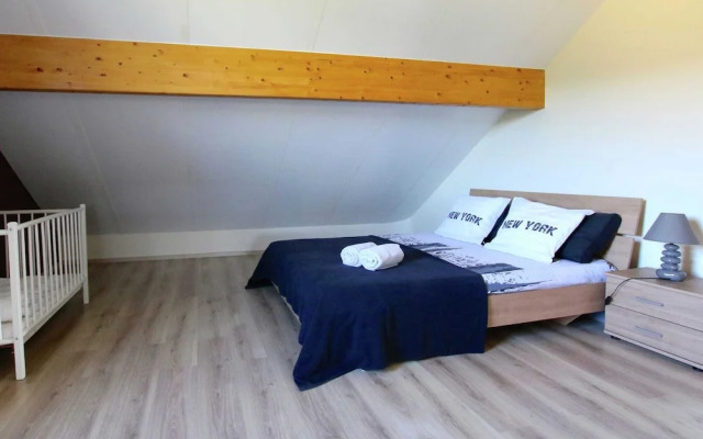 Classy Holiday Home in Martilly with Hot Tub