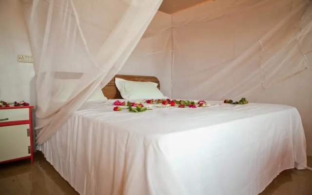 Madhu Beach Huts