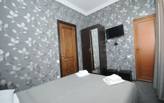 Отель 7 Rooms