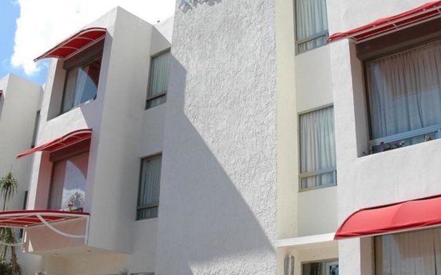 Отель Ambiance Suites Cancun Мексика, Канкун - 1 отзыв об отеле, цены и фото номеров - забронировать отель Ambiance Suites Cancun онлайн вид на фасад