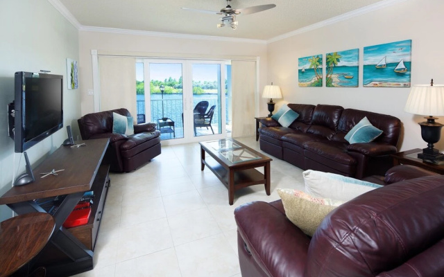 Sunrise Waterways by Cayman Vacation