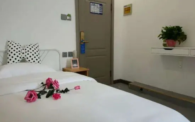 Daqing Boger Hotel (Xinmate Store)