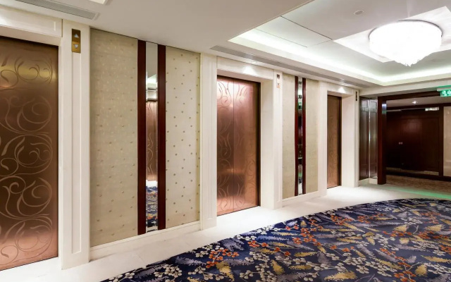 Отель Futian Shangri-La Shenzhen