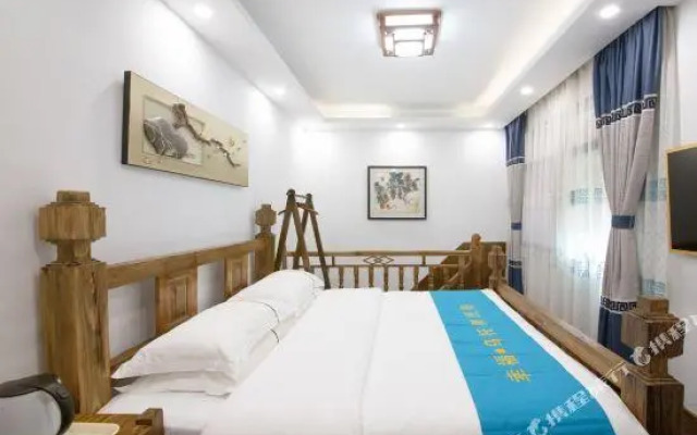 Xingfu Wutuobang Gufeng Qingshe Hostel