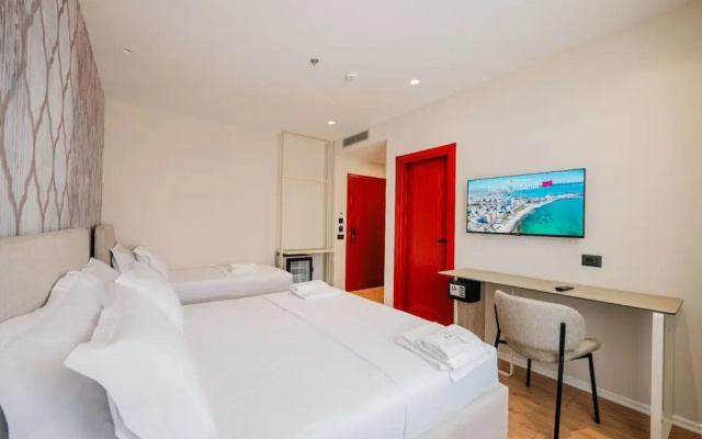 Ermes Deluxe Triple Room