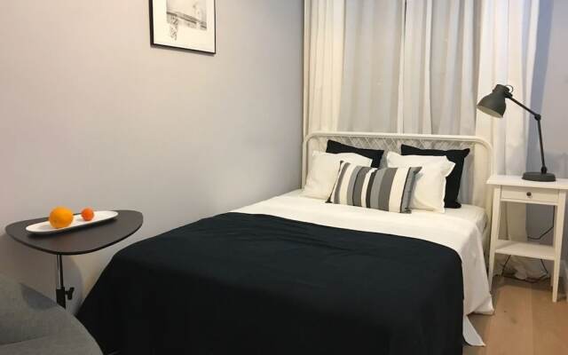 Апартаменты Downtown Apartments комната для гостей
