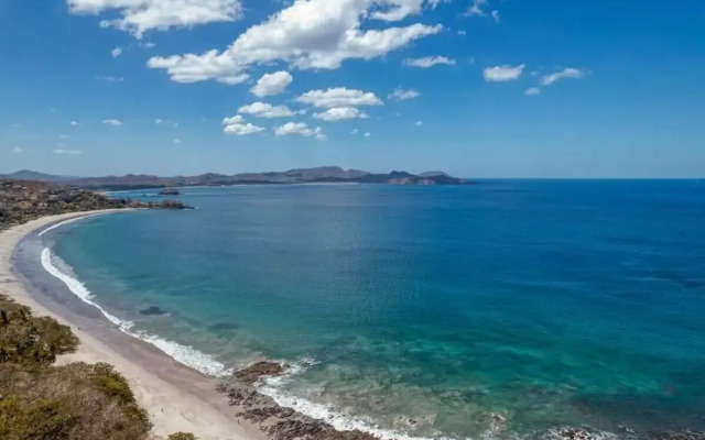 Modern Studio Apartment with Covered Balcony, Full Kitchen, and Stunning Ocean Views
