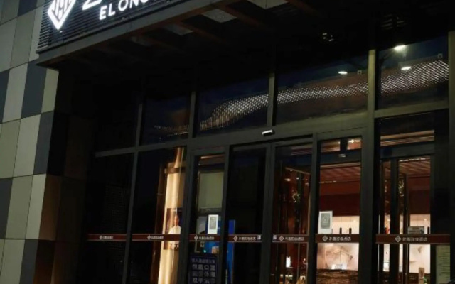 Elong Migao Fashion Hotel (Fei County New Bus Station)