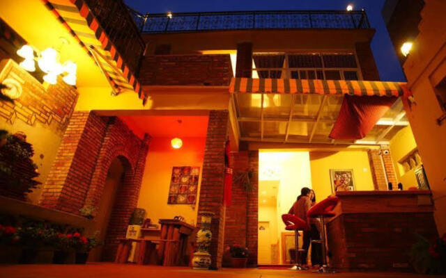 Отель Xiamen Gulangyu Mild Warm Inn Китай, Сямынь - отзывы, цены и фото номеров - забронировать отель Xiamen Gulangyu Mild Warm Inn онлайн вид на фасад