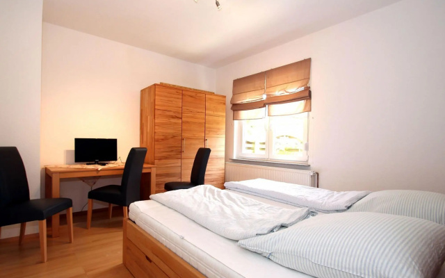 Apartment With a High Chair and bed