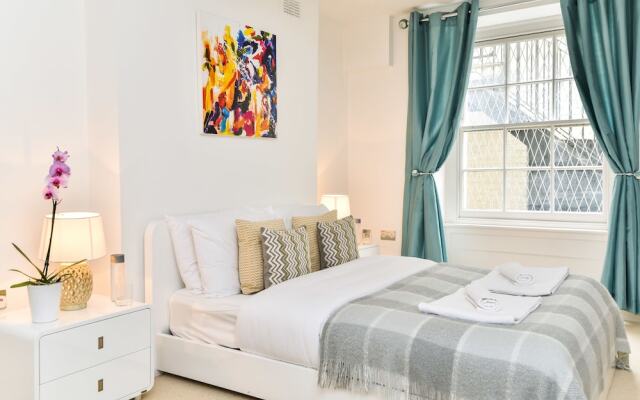 Апартаменты Warren Street Apartments комната для гостей