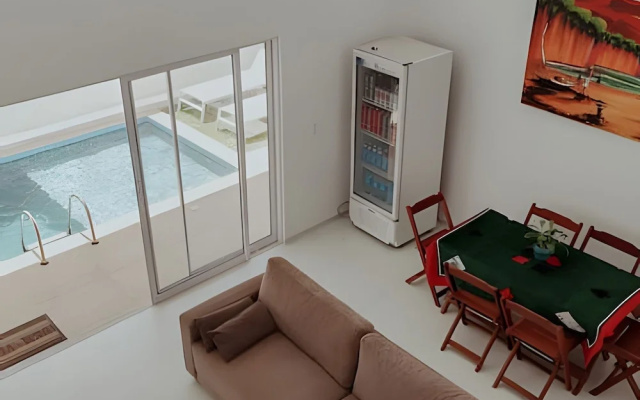 Família Pansini - Sua Casa na Pipa