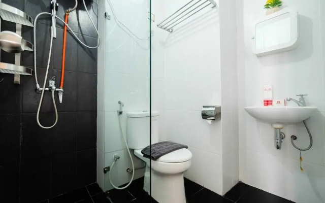 Minimalist Studio at Bassura City Apartment By Travelio