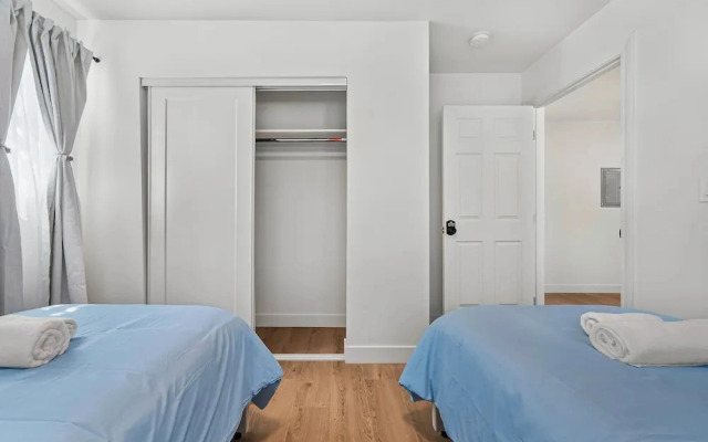 Spacious 8BR Home with AC & Parking