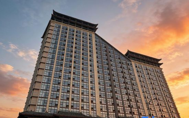 Qufu Xueerxing Hotel (East Railway Station Yuandong College)