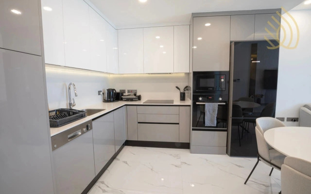 Апартаменты Stylish 1BR Sea View in Longbeach Iskele