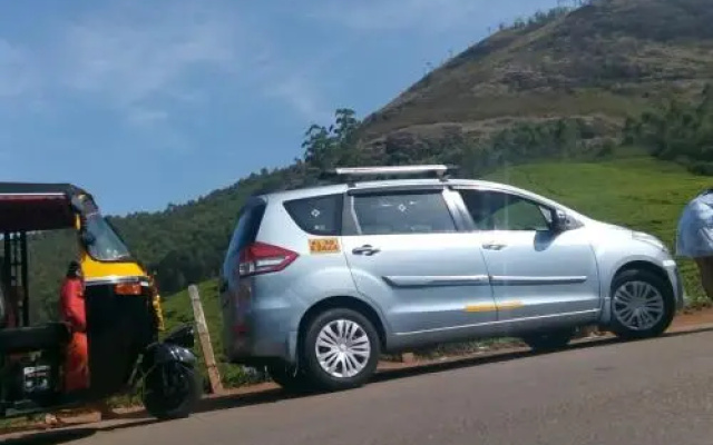 Munnar Pavithra Tours And Travel'S