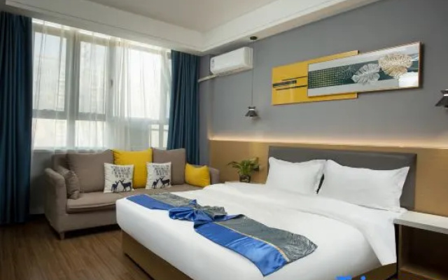 Xinkaicheng Business Hotel (Four Seasons City )