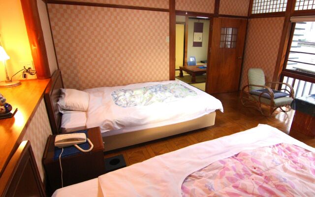 Отель Kiya Ryokan Мисаса комната для гостей