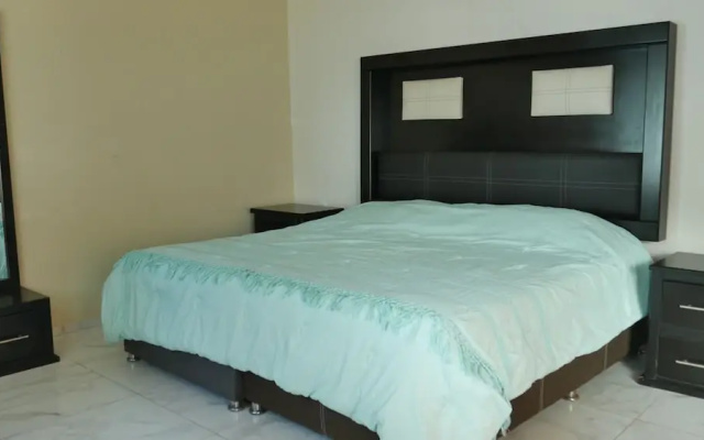 Casa Mister Ken pie de playa Los Cocos