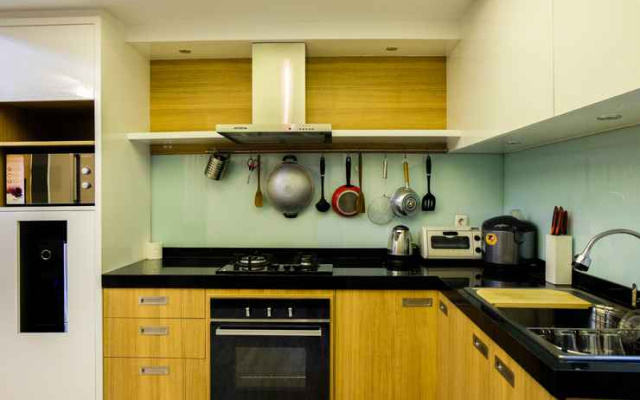 Relaxing 2BR with City View The Wave Apartment By Travelio