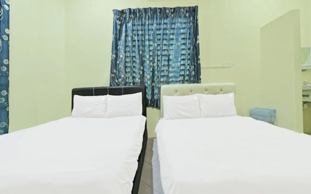 Oyo 90596 Casaria Inn
