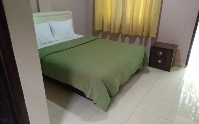Purnama House