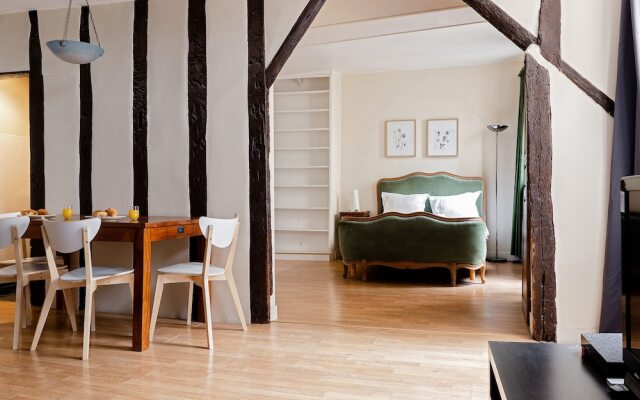 Апартаменты Central Paris - Chatelet Apartment Париж комната для гостей