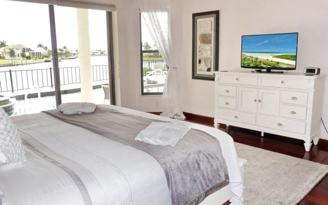 Waterfront Home on key lot With Pool, spa and Views