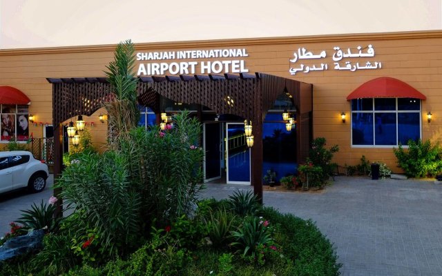 Отель Sharjah International Airport Hotel ОАЭ, Шарджа - отзывы, цены и фото номеров - забронировать отель Sharjah International Airport Hotel онлайн вид на фасад