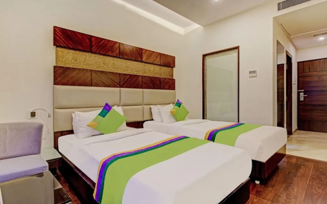 Treebo Trend Hotel Palladium Suites