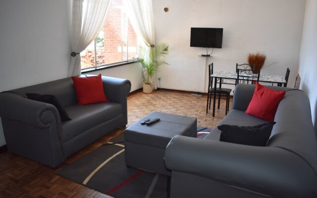 Brightcastle Harare City Apartments in Harare, Zimbabwe from 150$, photos, reviews - zenhotels.com guestroom