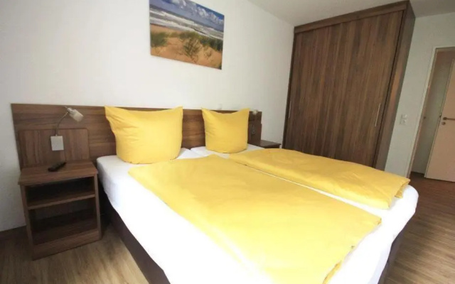 Ferienwohnung-304-Hohe-Lith-strandnah-mit-eigenem-Strandkorb-am-Meer