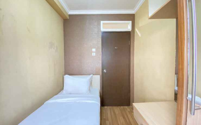 Cozy 2BR Apartment at Suites @Metro By Travelio