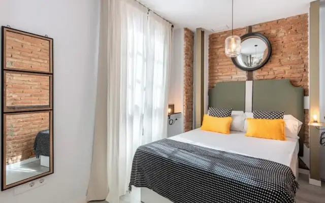 Apartamentos Puerta Elvira Suites 3000