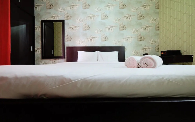 Minimalist Studio Room At Serpong Greenview By Travelio