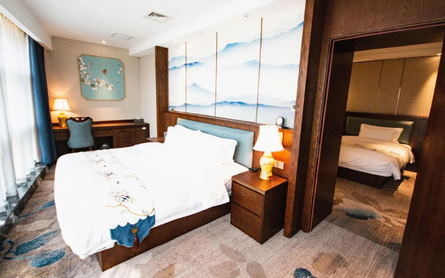 Tang Xiao-Zhu · Tangshan Feast Cultural and Tourism Hotel