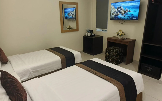 Amos Cozy Hotel & Convention Hall