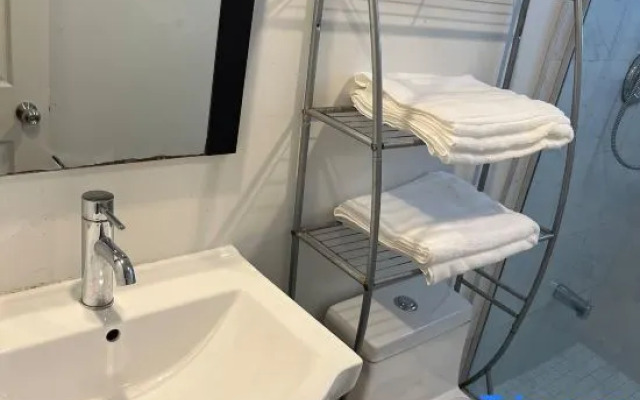 Self-contained Queen Suite • Private Kitchenette & Bath